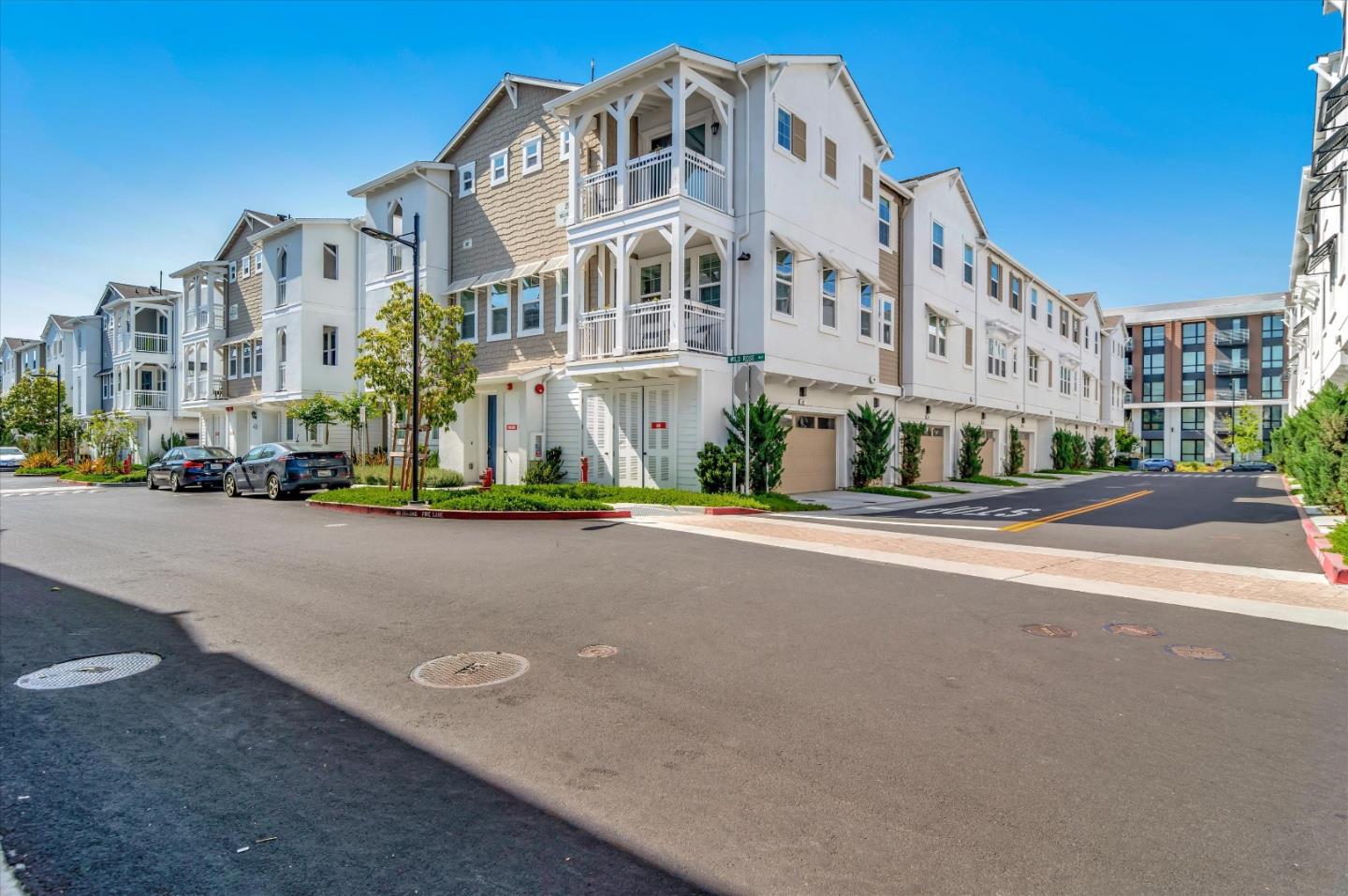 305 Wild Rose Way Milpitas, CA 95035 - Photo 26 of 41 a view of a street with a building in the background