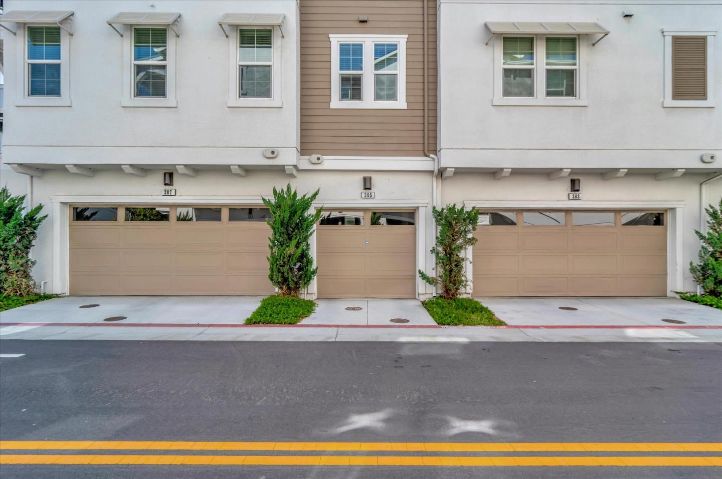 305 Wild Rose Way Milpitas, CA 95035 - Photo 27 of 41 a front view of a house with garage and plants