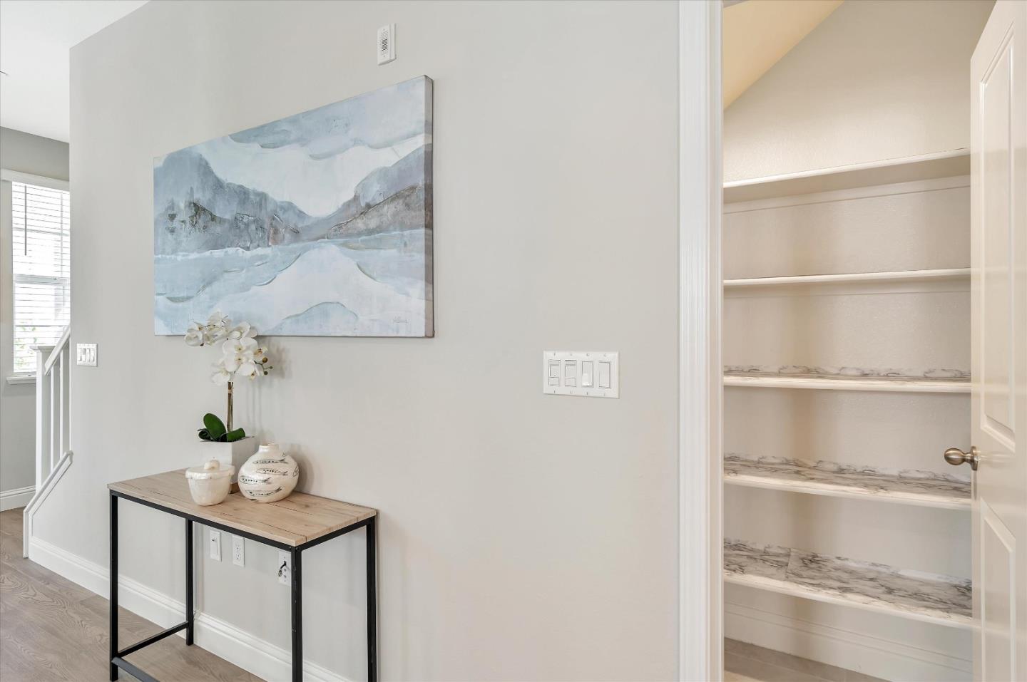 305 Wild Rose Way Milpitas, CA 95035 - Photo 9 of 41 a room with a table and a vase