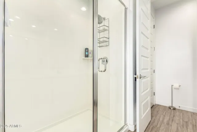 a view of a bathroom from a hallway