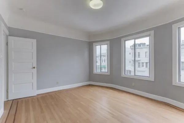 a view of an empty room with a window