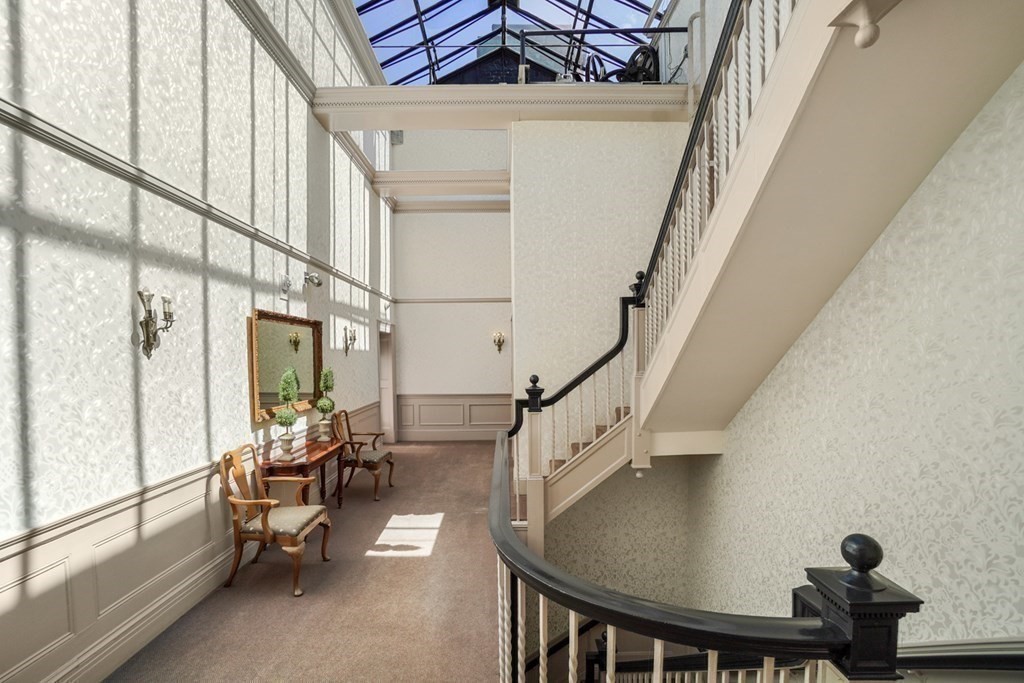 333 Commonwealth Avenue, Unit PH22 Boston, MA 02115 - Photo 37 of 42 a view of entryway and hall with wooden floor