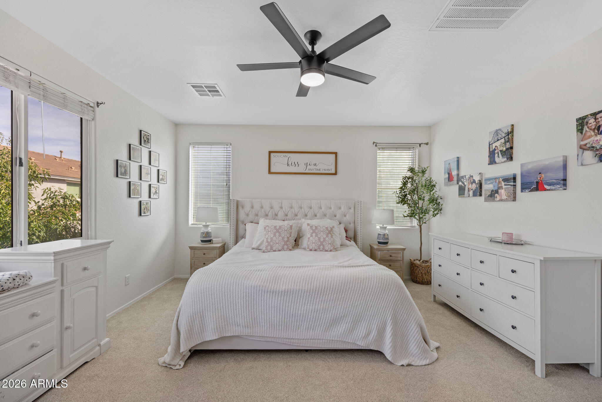 3458 East Robin Lane Gilbert, AZ 85296 - Photo 18 of 32 a bedroom with a bed and a dresser