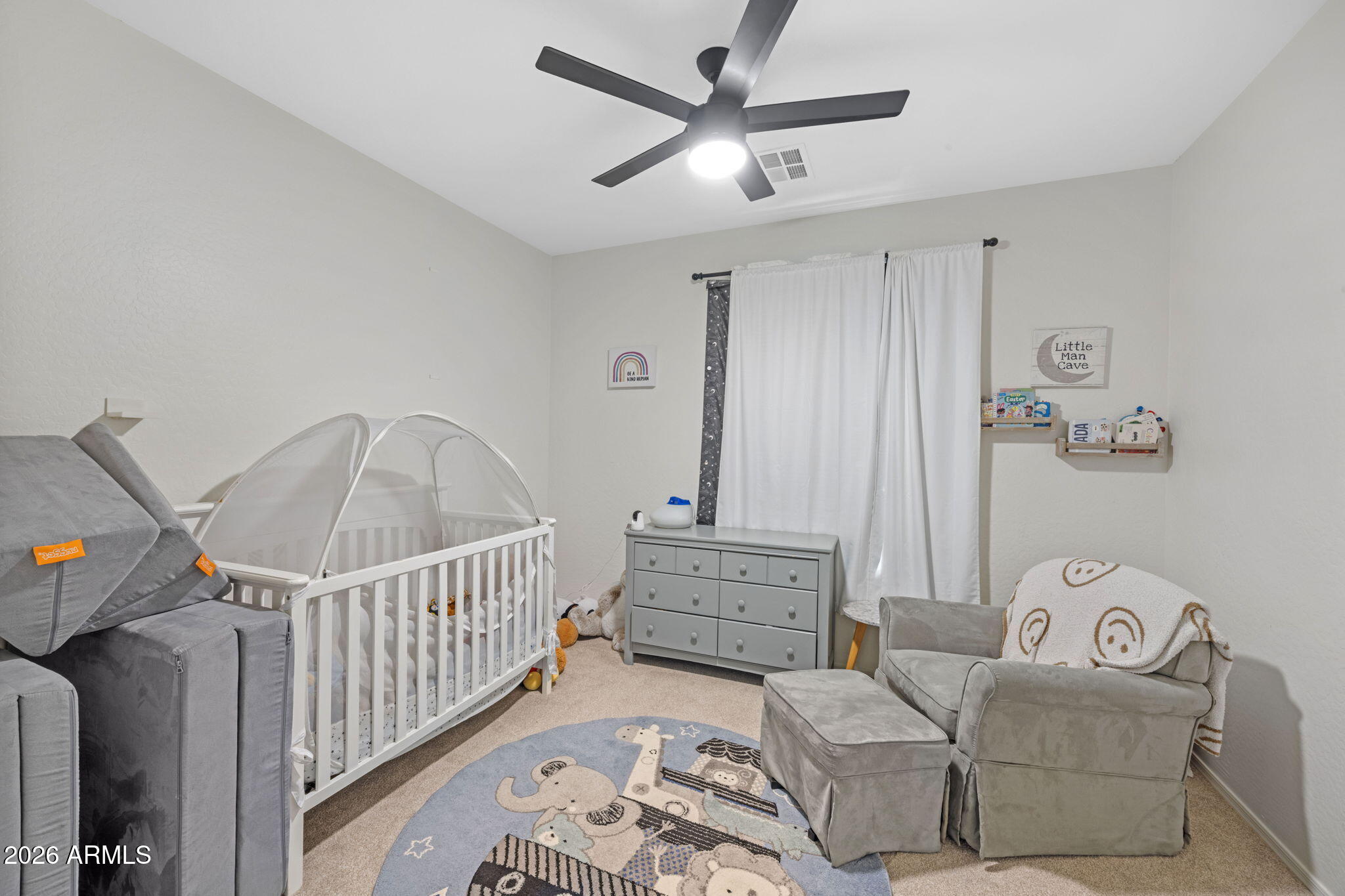 3458 East Robin Lane Gilbert, AZ 85296 - Photo 25 of 32 a bedroom with furniture and white walls