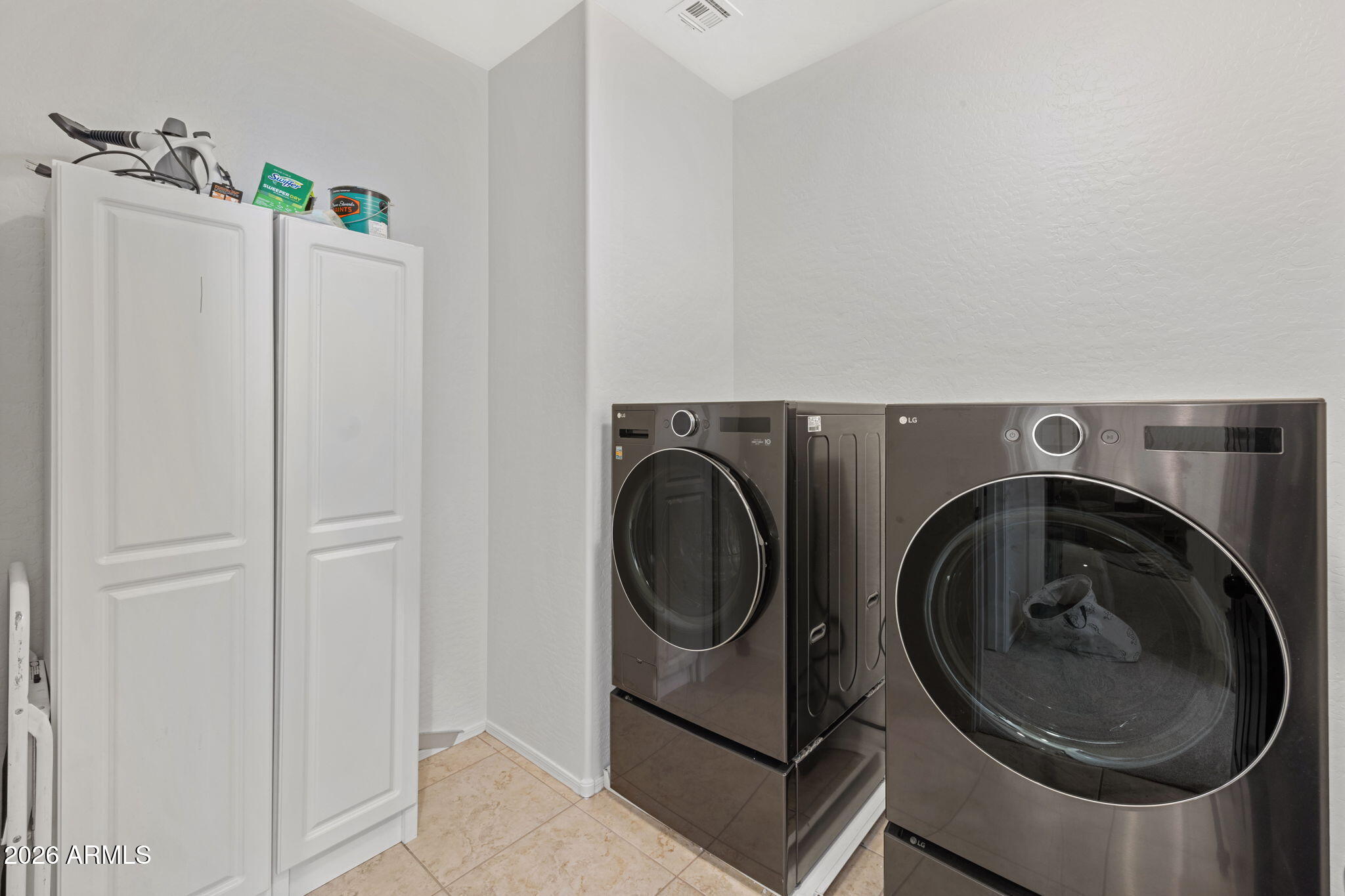 3458 East Robin Lane Gilbert, AZ 85296 - Photo 28 of 32 a utility room with dryer and washer