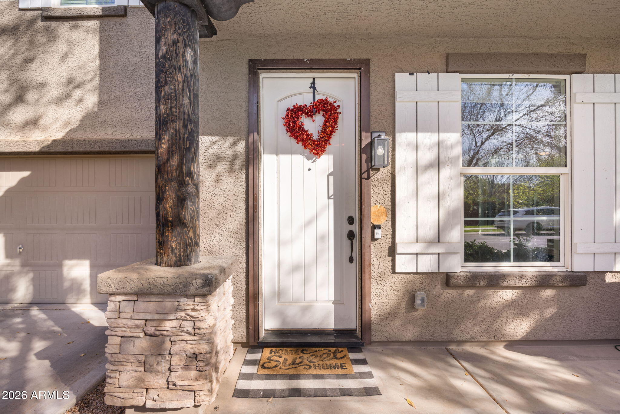 3458 East Robin Lane Gilbert, AZ 85296 - Photo 3 of 32 a view of a entryway door front of a house