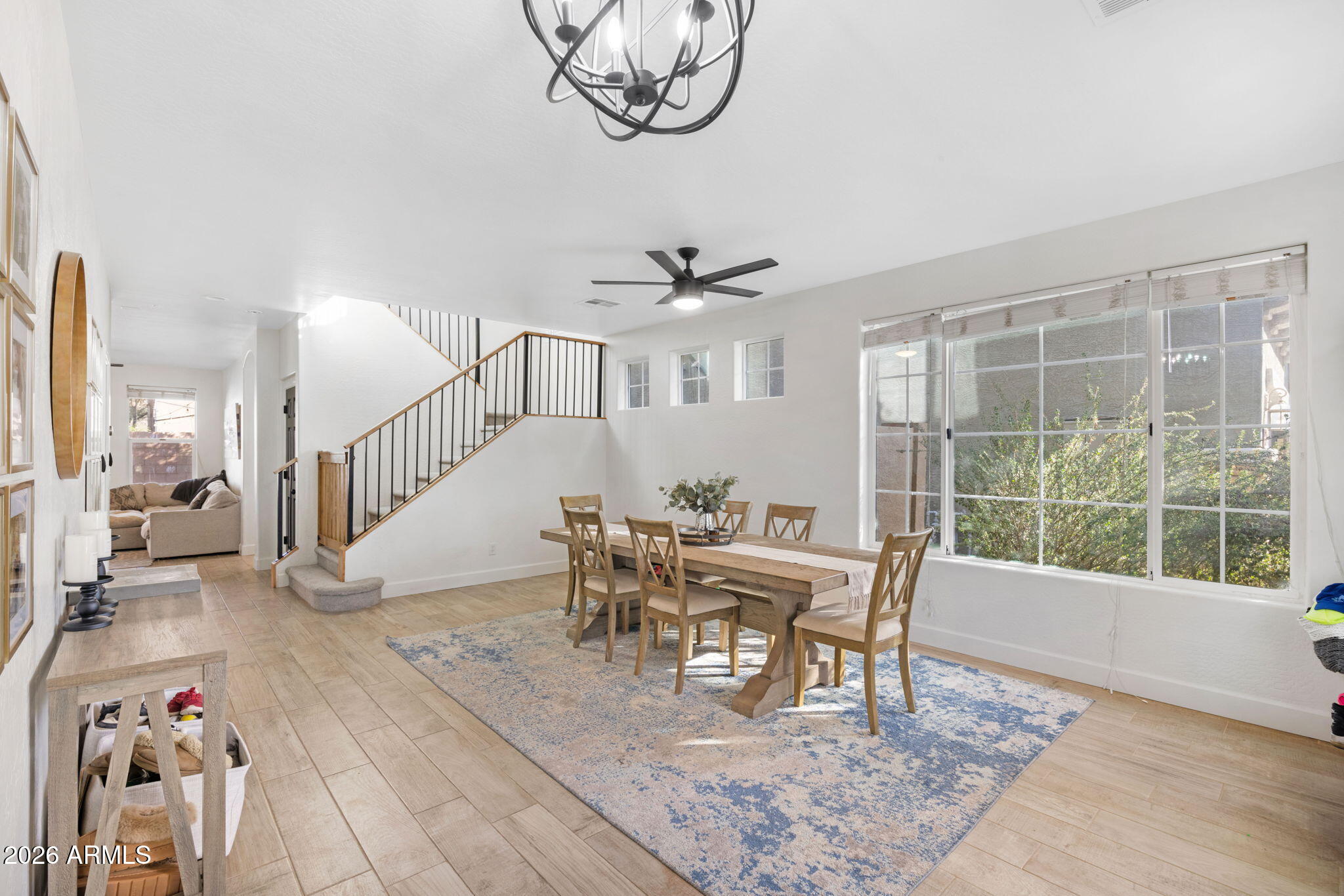 3458 East Robin Lane Gilbert, AZ 85296 - Photo 4 of 32 a view of a livingroom with furniture and a table chair