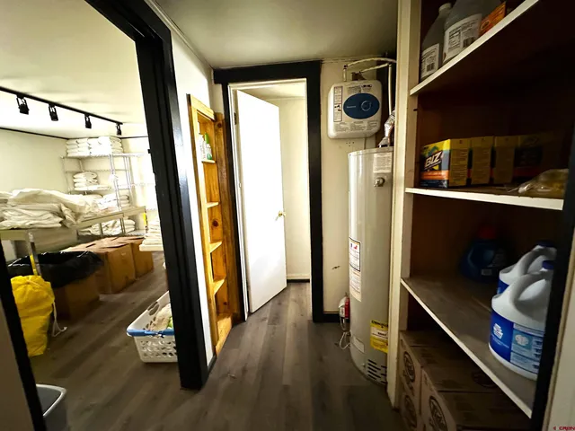 a bathroom with a sink mirror and vanity