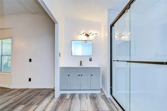 a view of a bathroom from the hallway