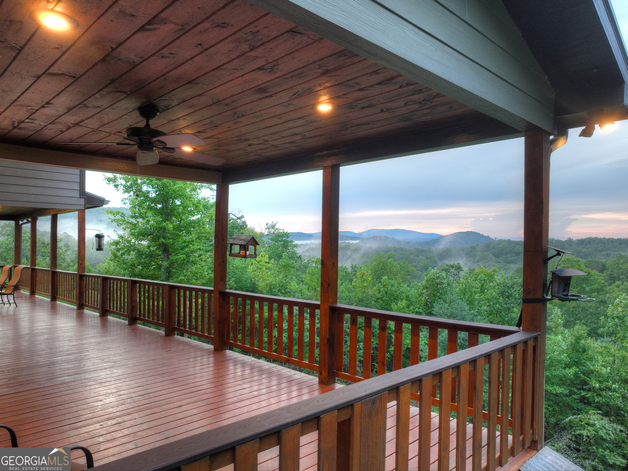 785 Wehunt Road Epworth, GA 30541 - Photo 19 of 73 a view of balcony with wooden floor