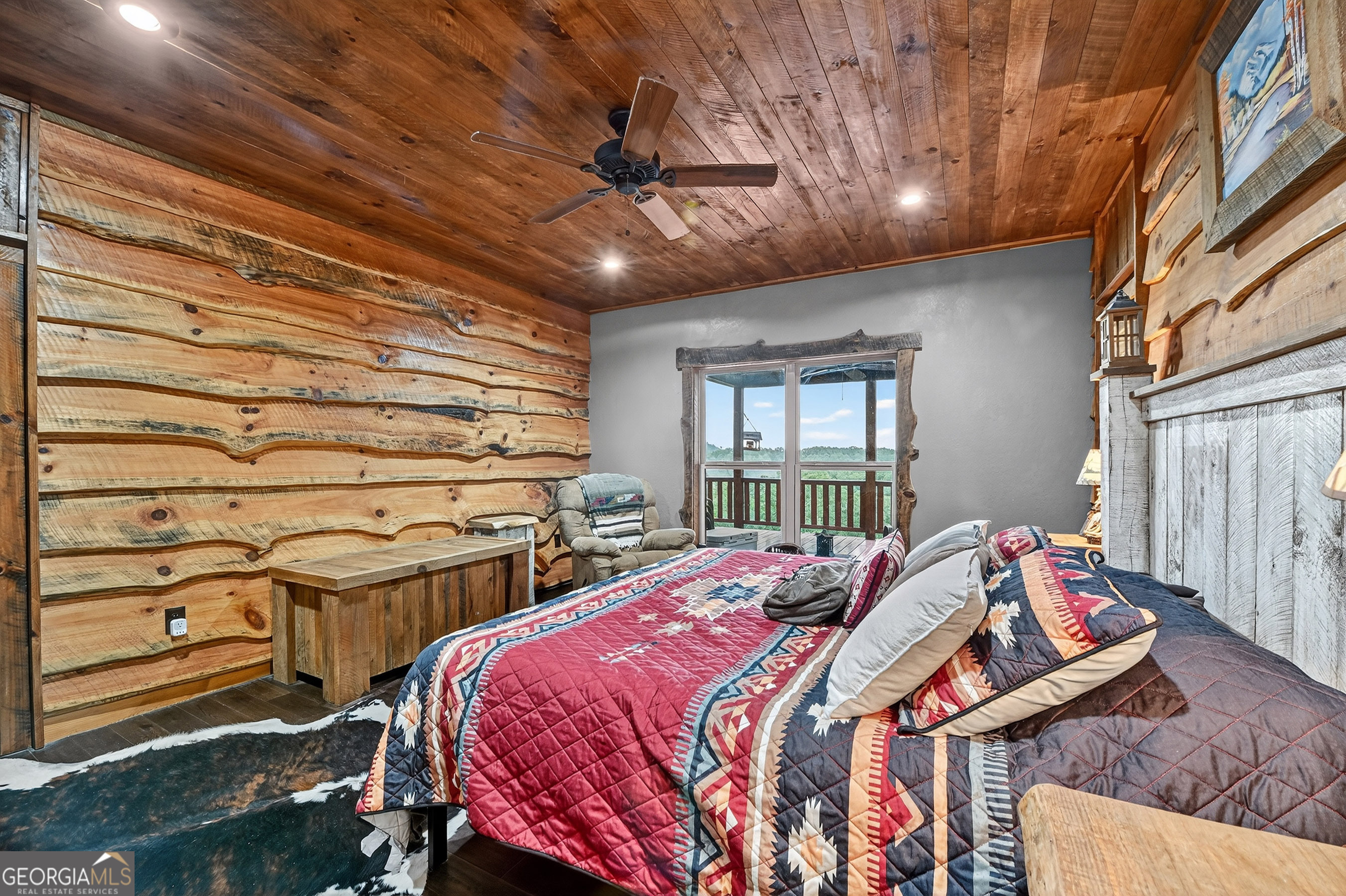 785 Wehunt Road Epworth, GA 30541 - Photo 23 of 73 a bed sitting in a bedroom next to a window
