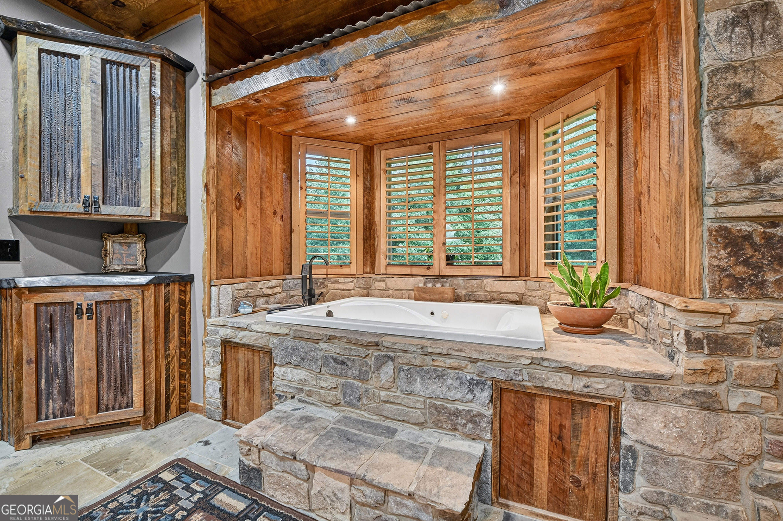 785 Wehunt Road Epworth, GA 30541 - Photo 26 of 73 a bathroom with granite countertop a sink and a window