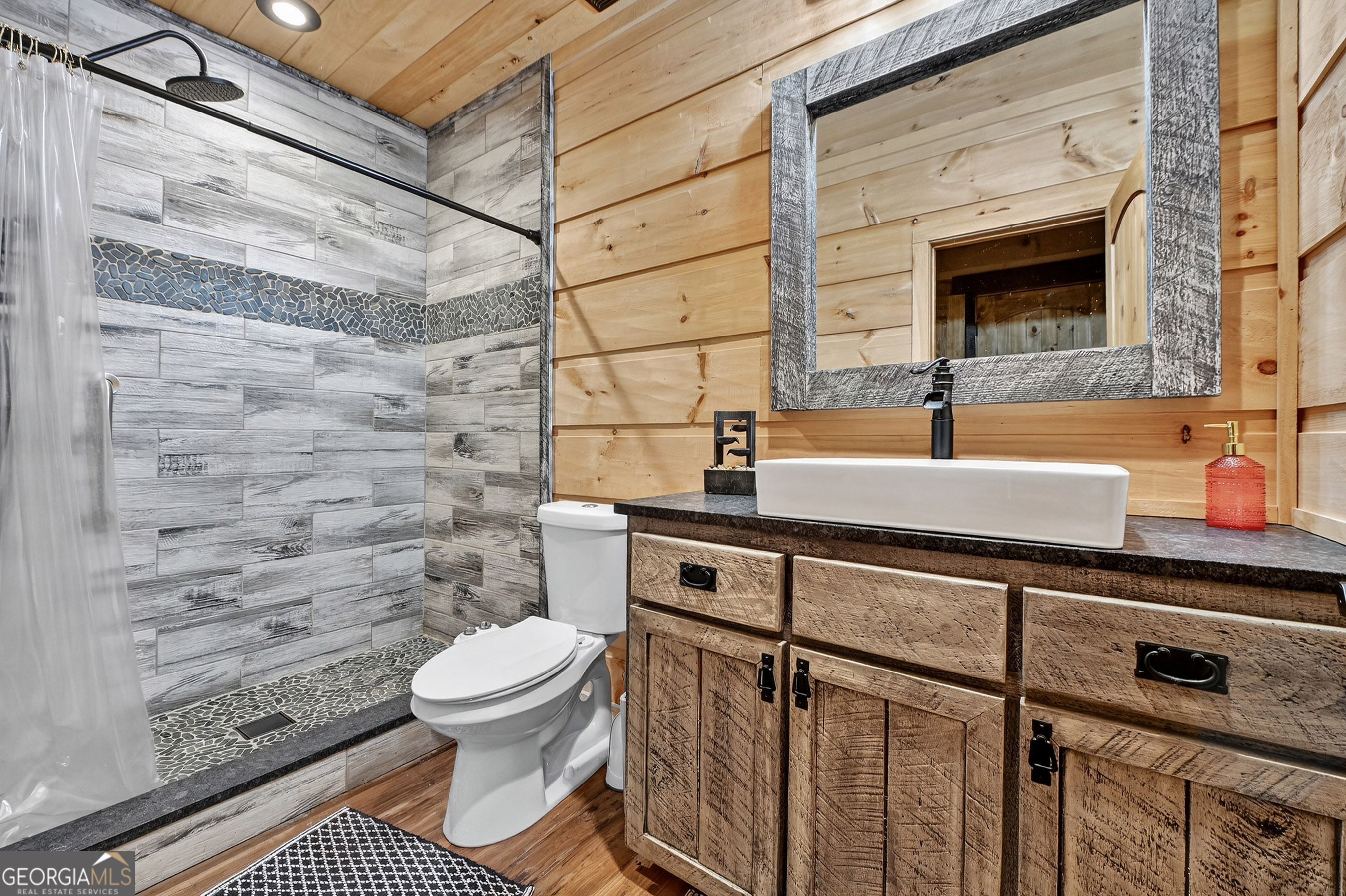 785 Wehunt Road Epworth, GA 30541 - Photo 41 of 73 a bathroom with a sink toilet and shower