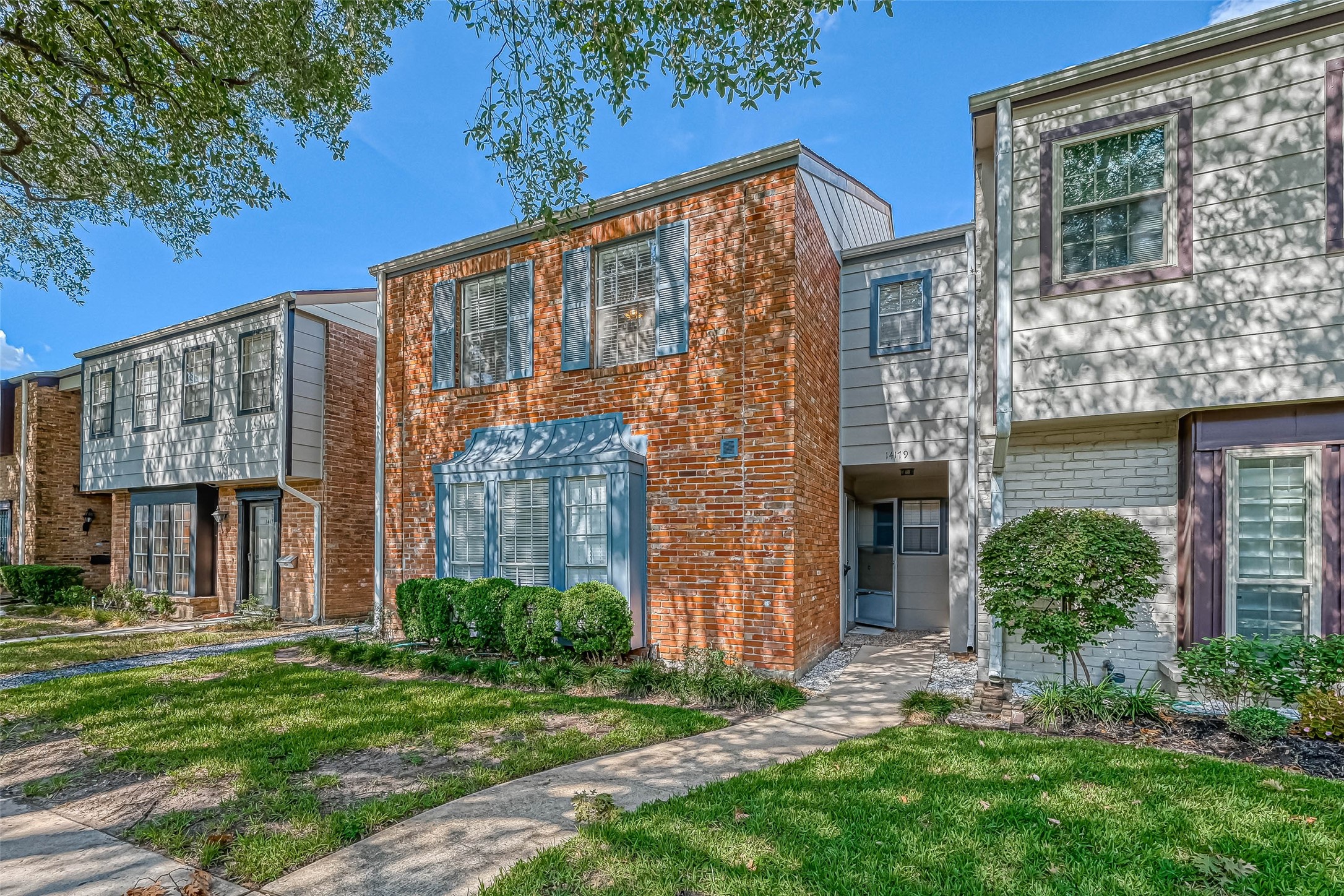 14179 Misty Meadow Lane Houston, TX 77079 - Photo 6 of 41 front view of a house with a yard