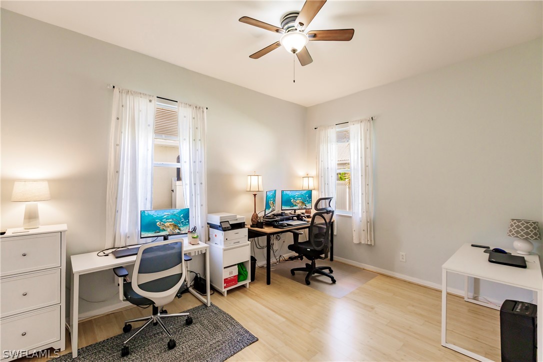 12901 Timber Ridge Drive Fort Myers, FL 33913 - Photo 32 of 49 a view of a workspace with furniture and a window