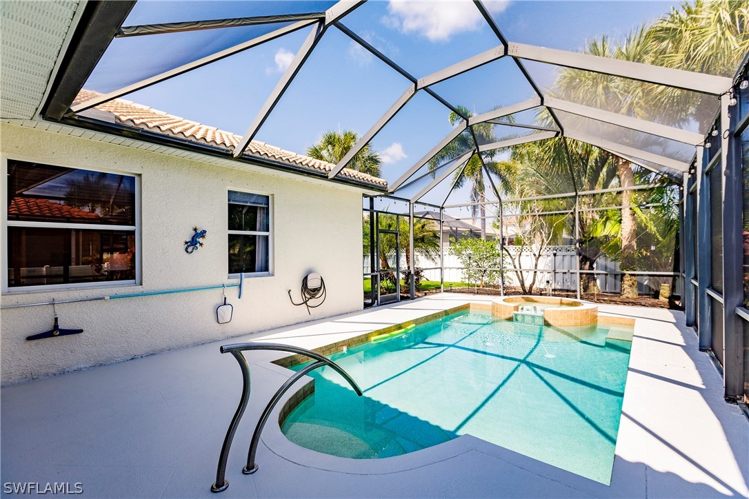 12901 Timber Ridge Drive Fort Myers, FL 33913 - Photo 39 of 49 a room with pool table and windows
