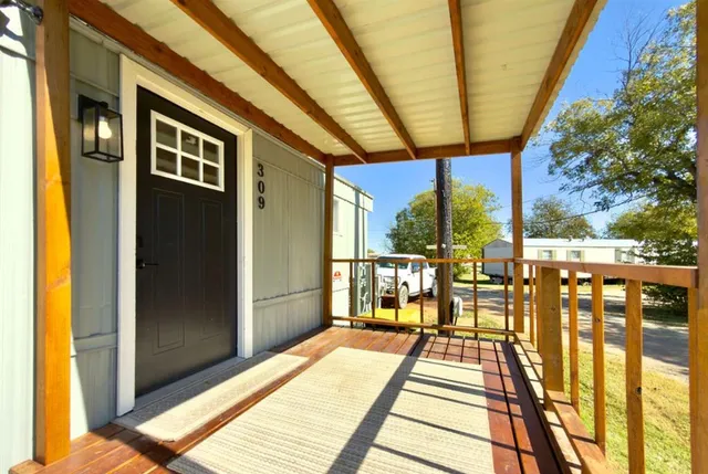 a view of balcony with a glass door
