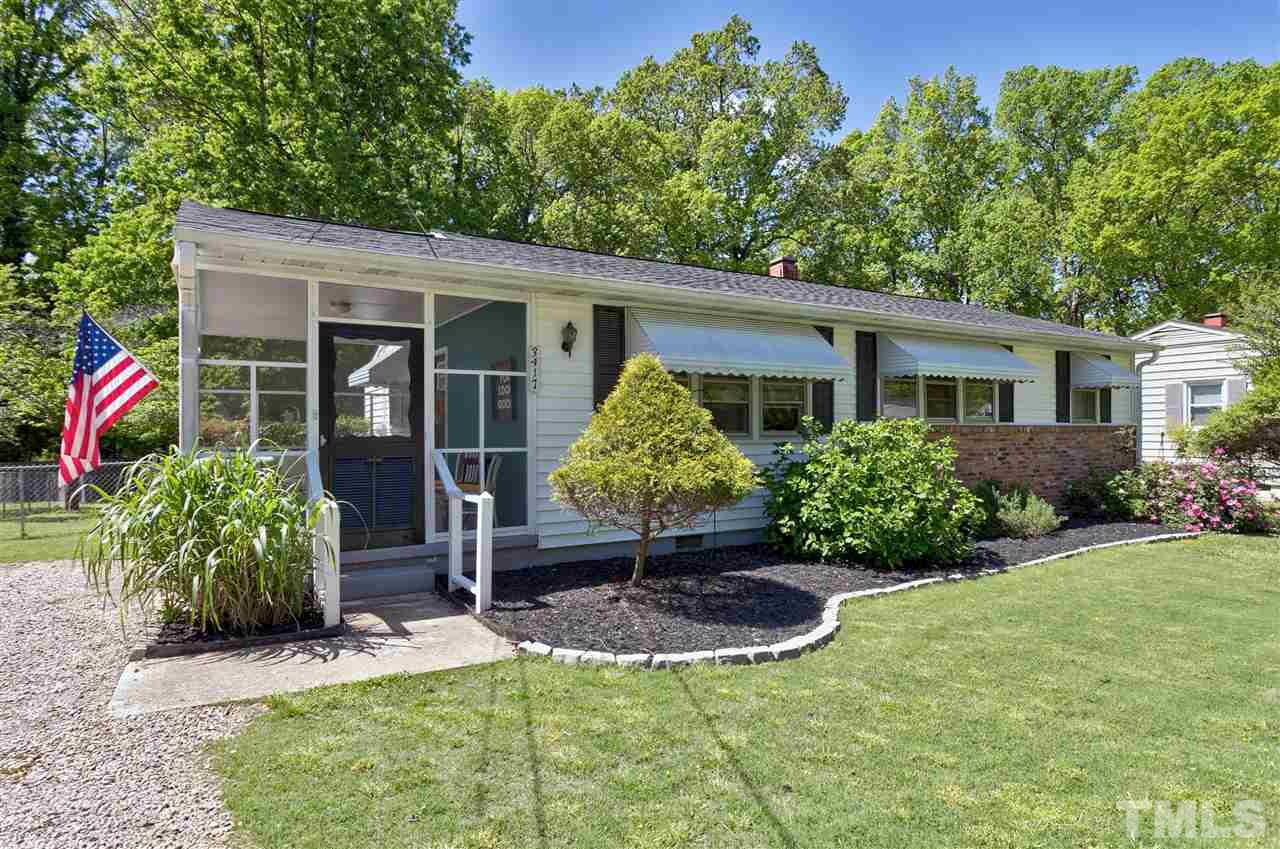 3417 Apache Drive Raleigh, NC 27609 - Photo 2 of 25 a house view with a garden space