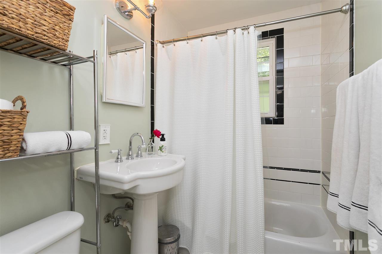 3417 Apache Drive Raleigh, NC 27609 - Photo 13 of 25 a bathroom with a sink toilet and shower