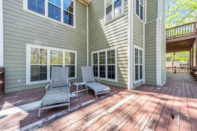 a view of a two chairs in the deck