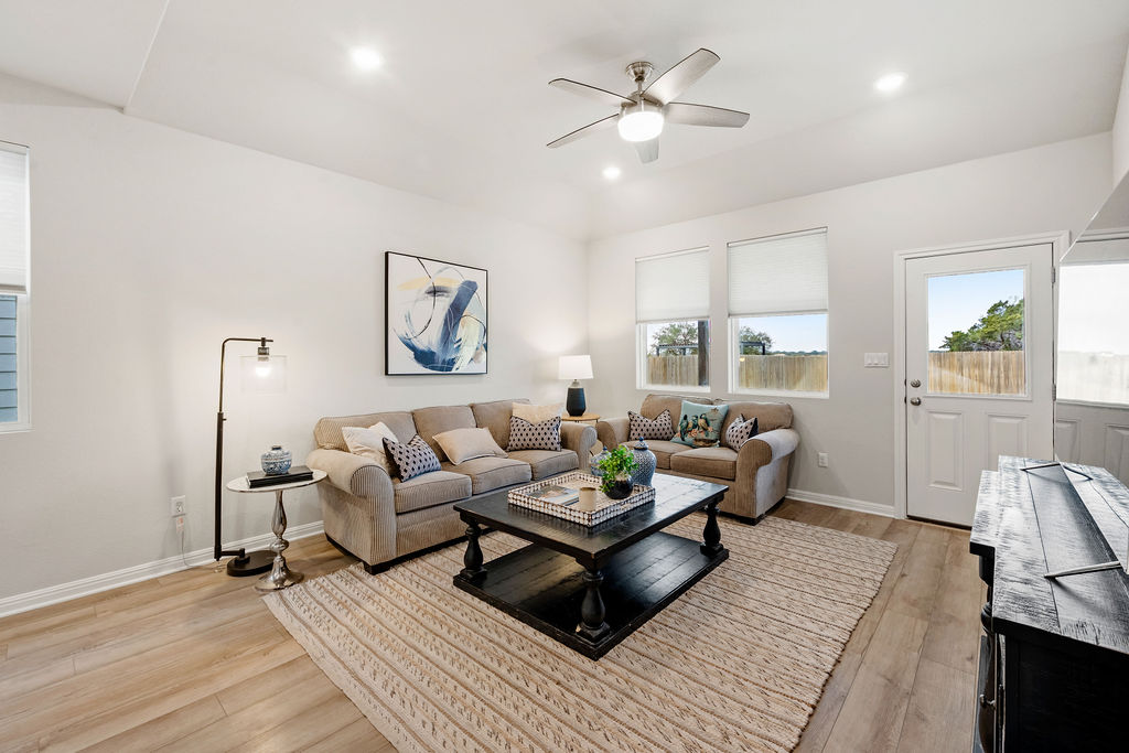 2417 Roosevelt Road Leander, TX 78641 - Photo 20 of 40 Living area with light wood-style floors, ceiling fan, and recessed lighting