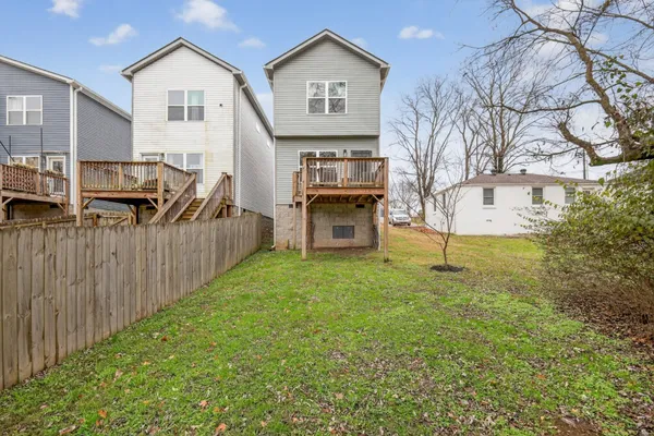 a view of a front of house with a yard