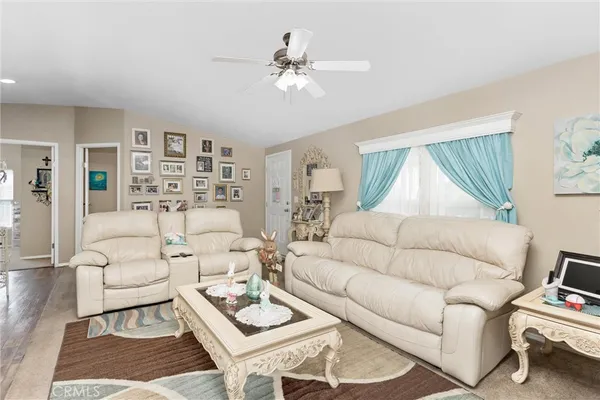 a living room with furniture and a rug