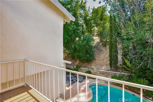 a view of a balcony with an outdoor space