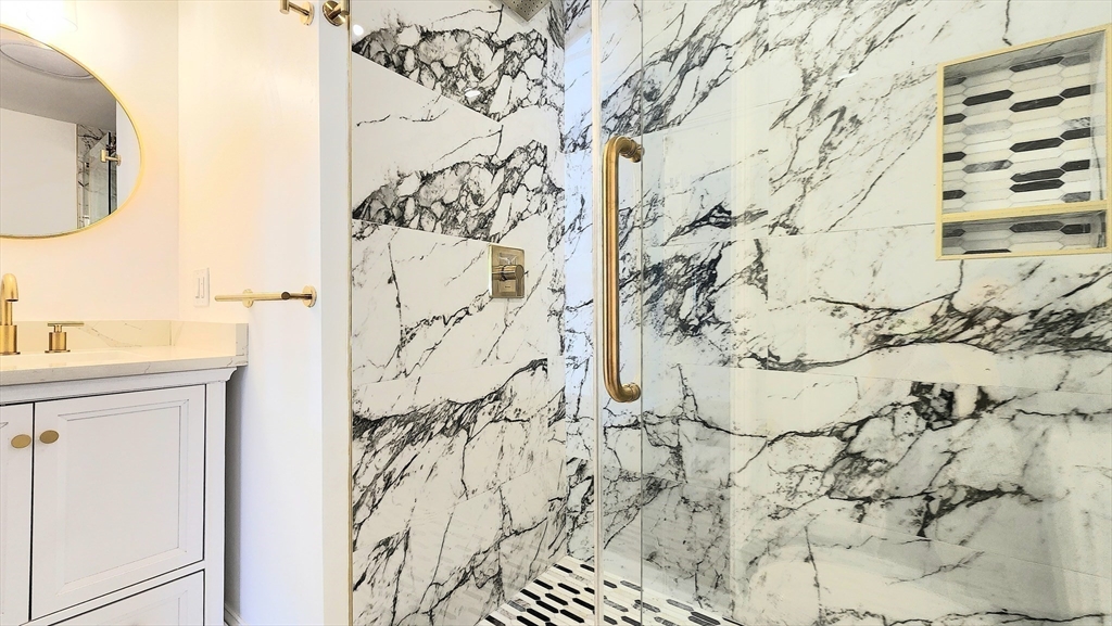 11 Christopher Road Brockton, MA 02302 - Photo 12 of 22 a bathroom with a bathtub and shower