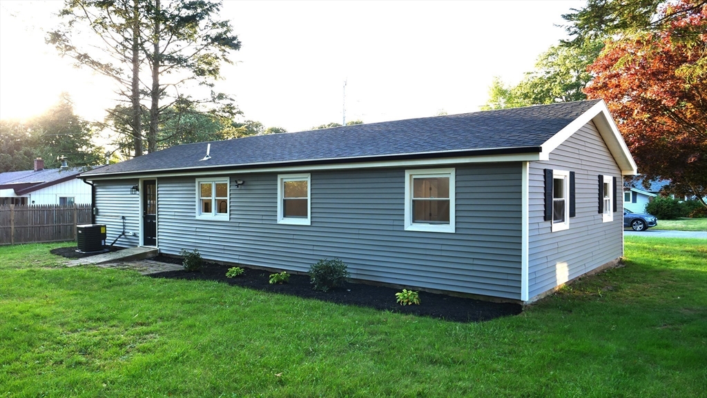 11 Christopher Road Brockton, MA 02302 - Photo 2 of 22 a view of a house with a yard