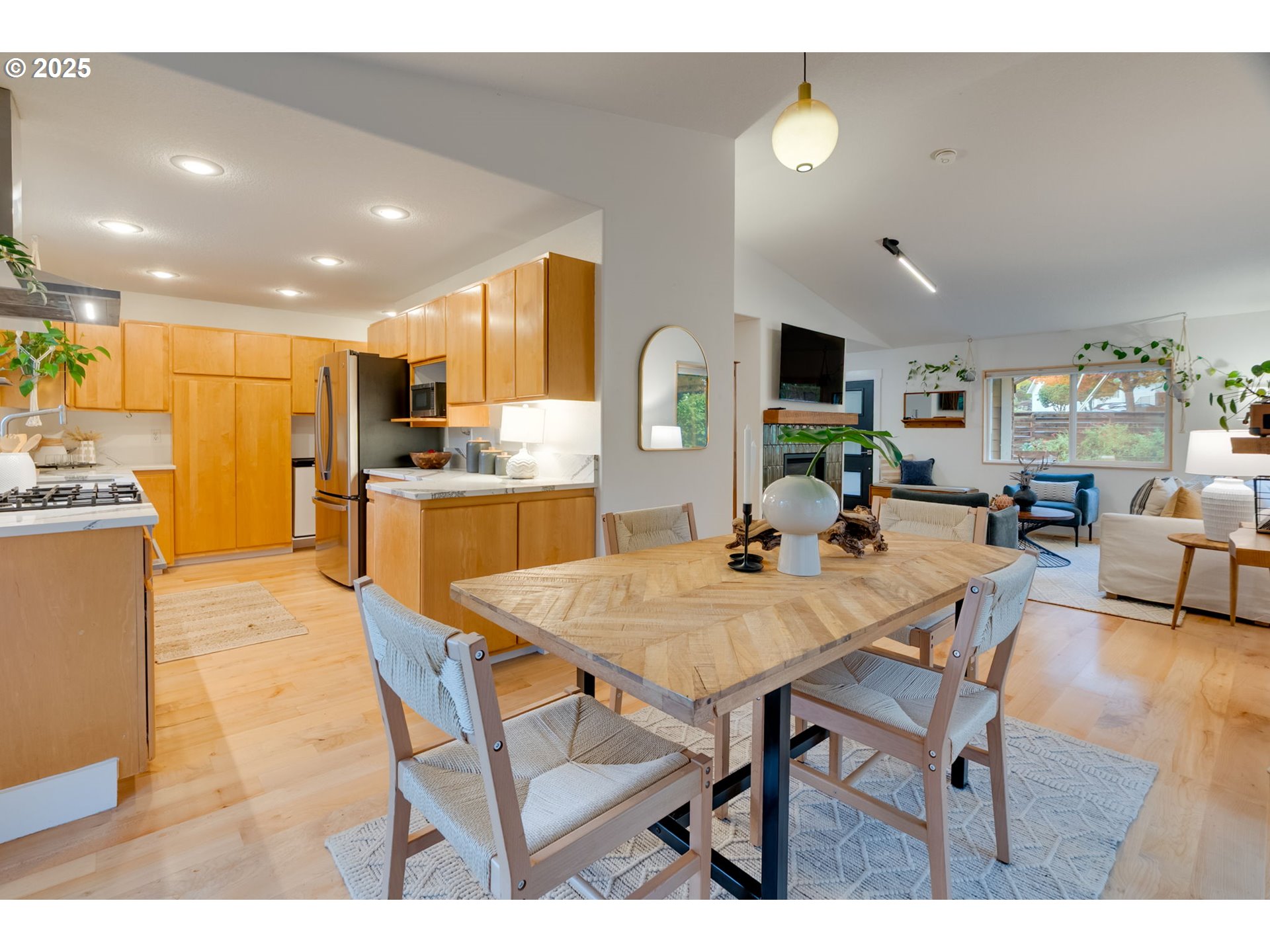 2733 Northeast 92nd Avenue Portland, OR 97220 - Photo 15 of 48 a view of kitchen with kitchen island dining table and chairs