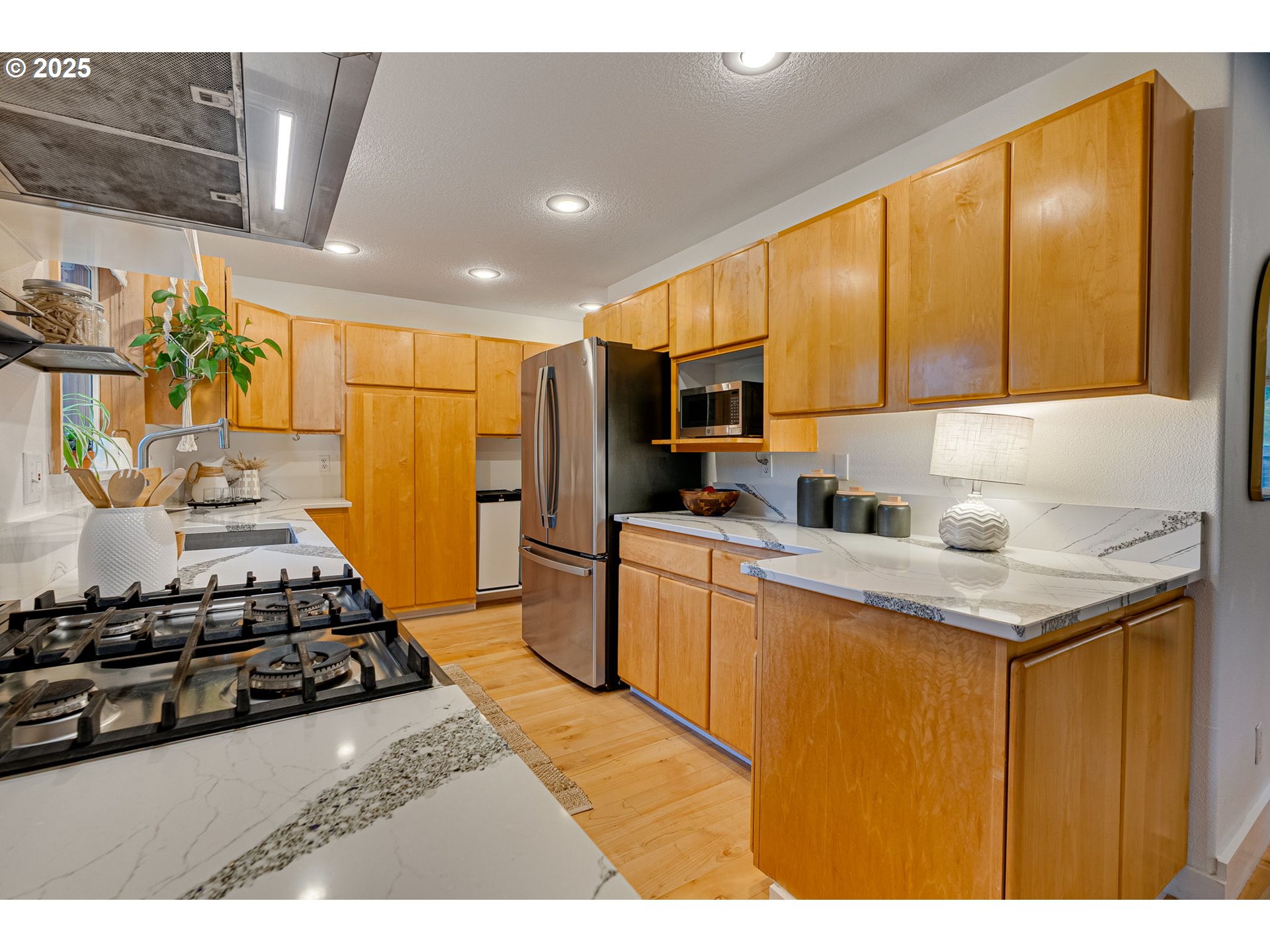 2733 Northeast 92nd Avenue Portland, OR 97220 - Photo 20 of 48 a kitchen with a stove a sink and a refrigerator