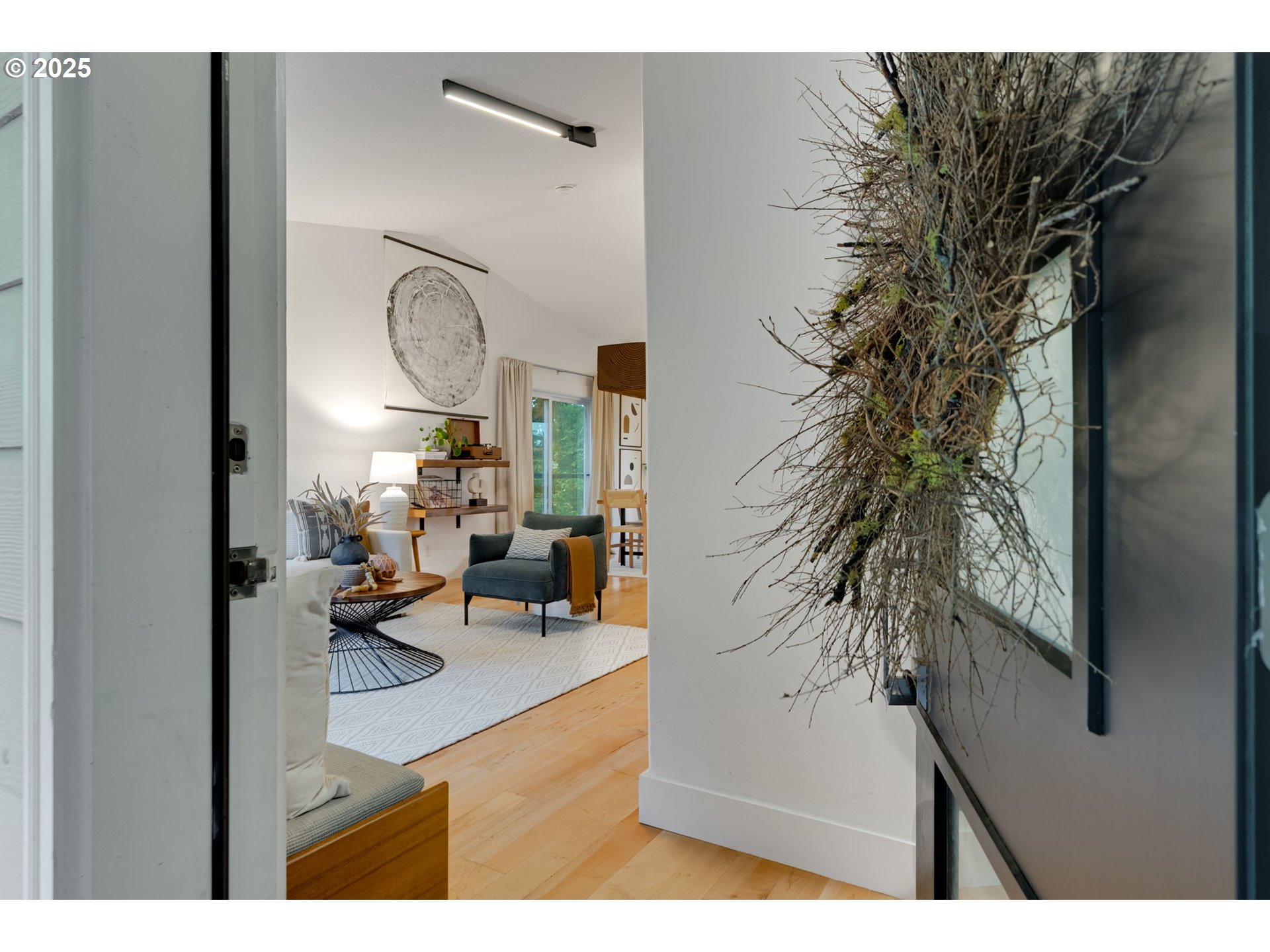 2733 Northeast 92nd Avenue Portland, OR 97220 - Photo 3 of 48 a living room with furniture and a potted plant