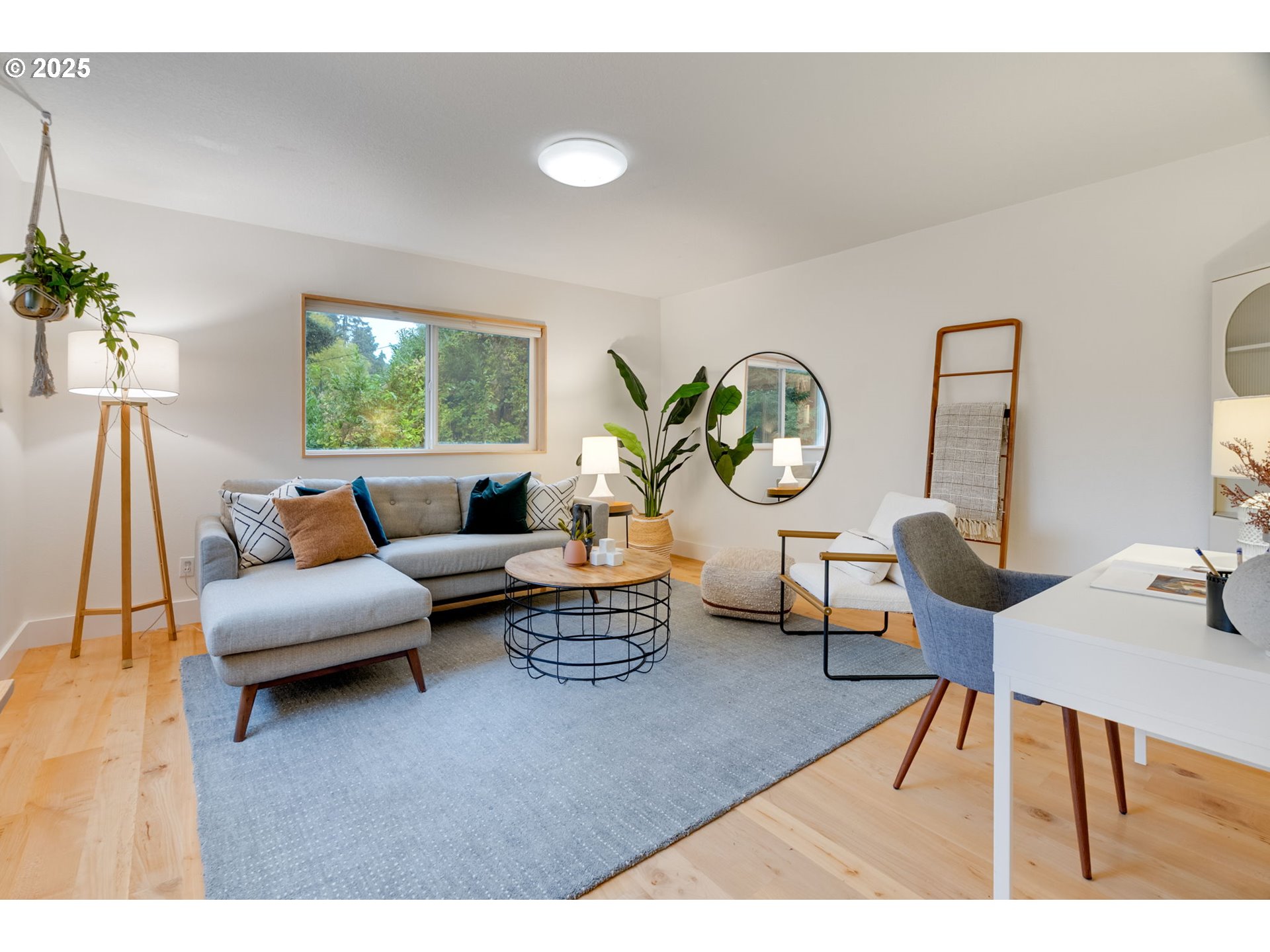 2733 Northeast 92nd Avenue Portland, OR 97220 - Photo 31 of 48 a living room with furniture a table and a large window