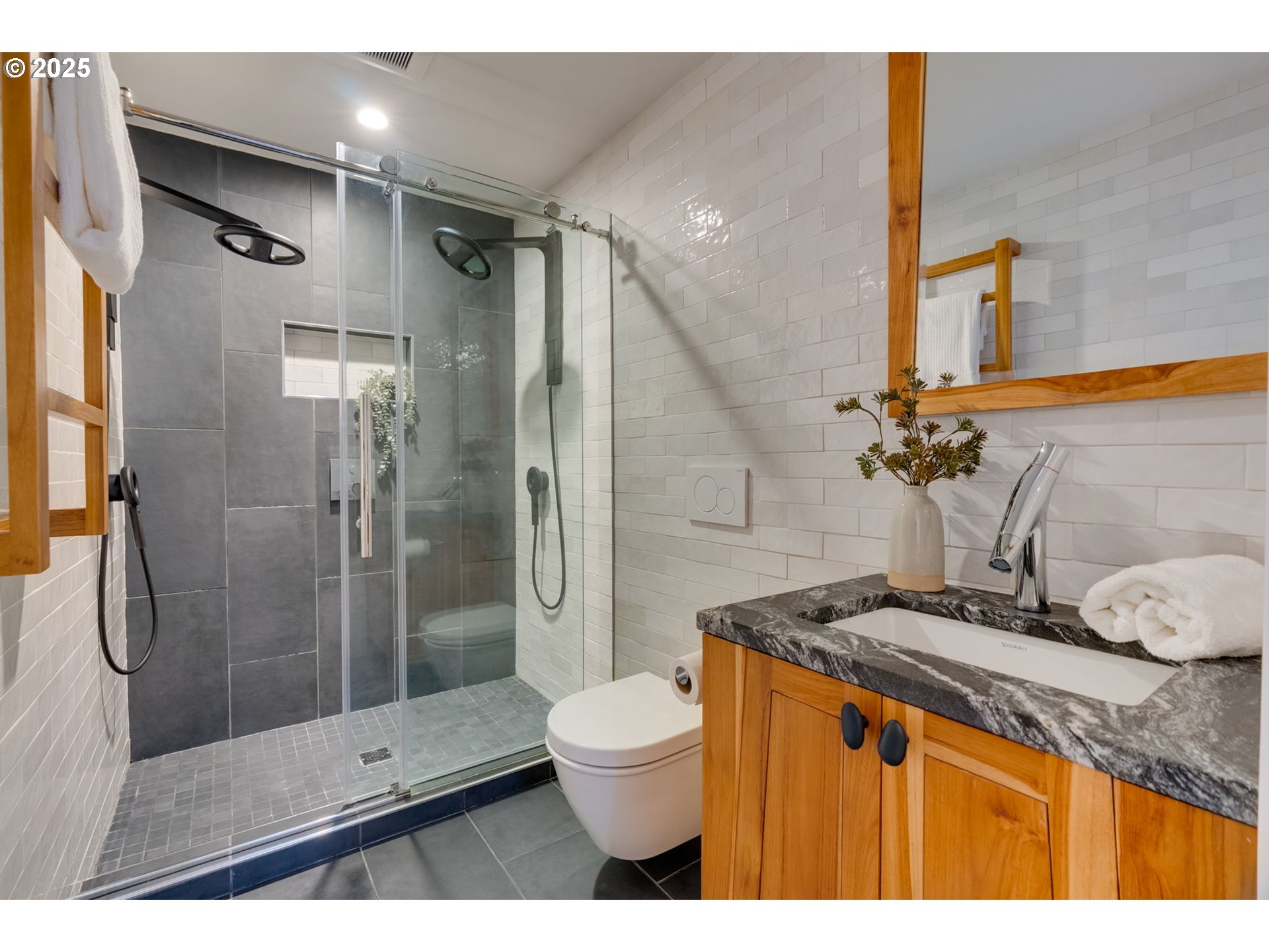 2733 Northeast 92nd Avenue Portland, OR 97220 - Photo 33 of 48 a bathroom with a granite countertop sink toilet a mirror and shower