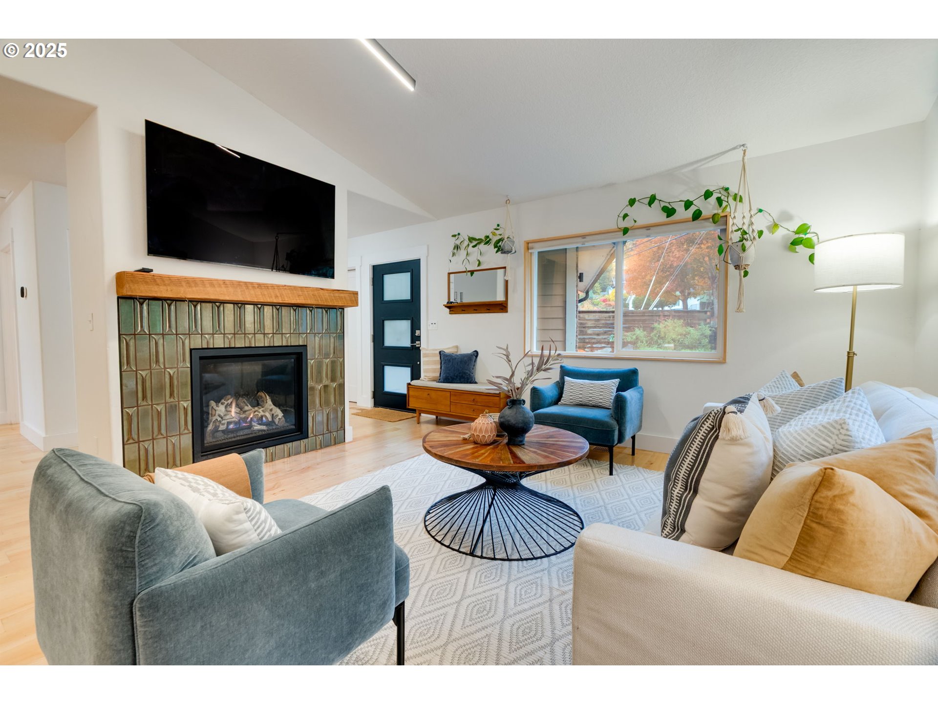 2733 Northeast 92nd Avenue Portland, OR 97220 - Photo 5 of 48 a living room with furniture and a fireplace