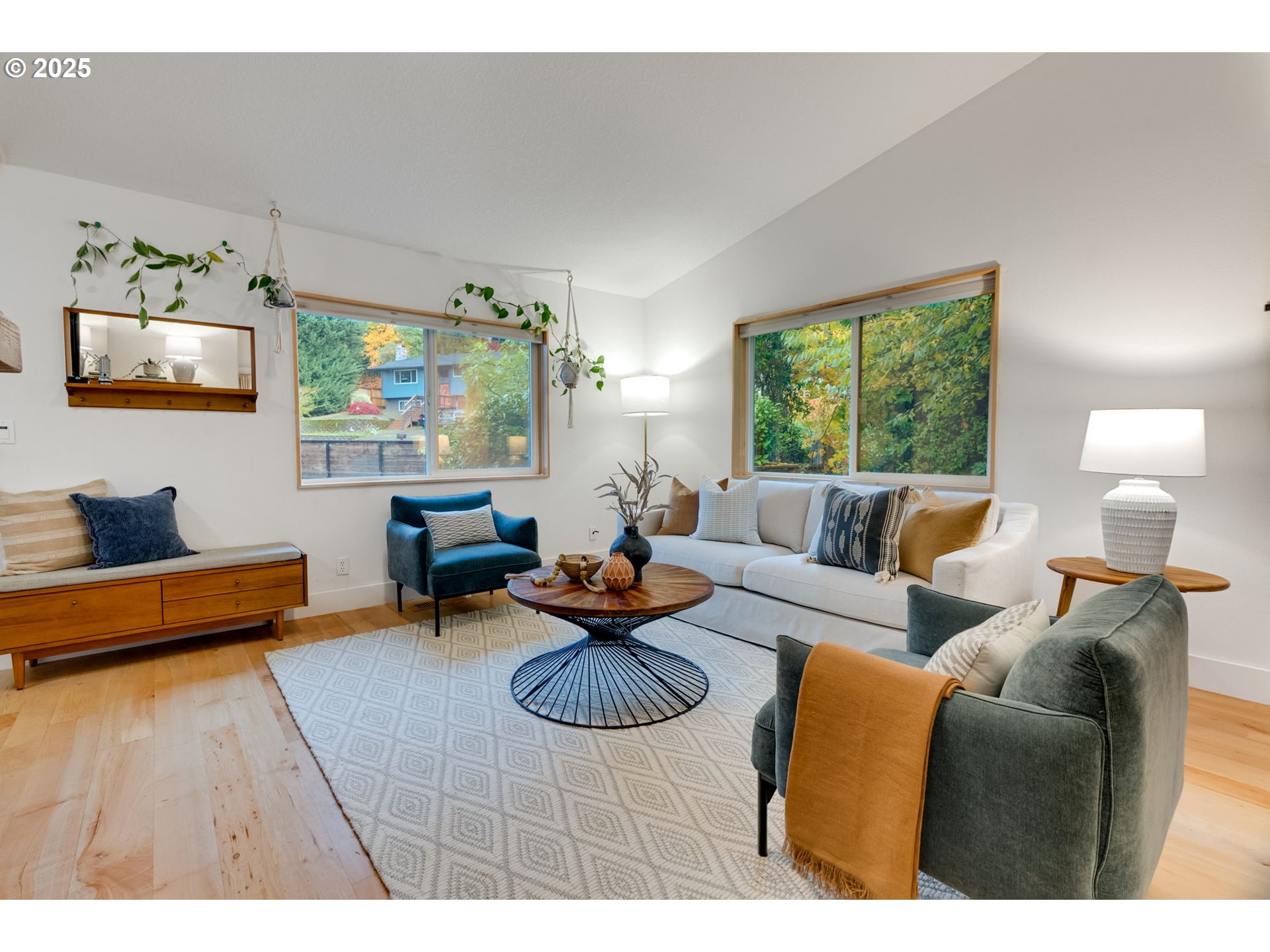 2733 Northeast 92nd Avenue Portland, OR 97220 - Photo 7 of 48 a living room with furniture a rug and a large window