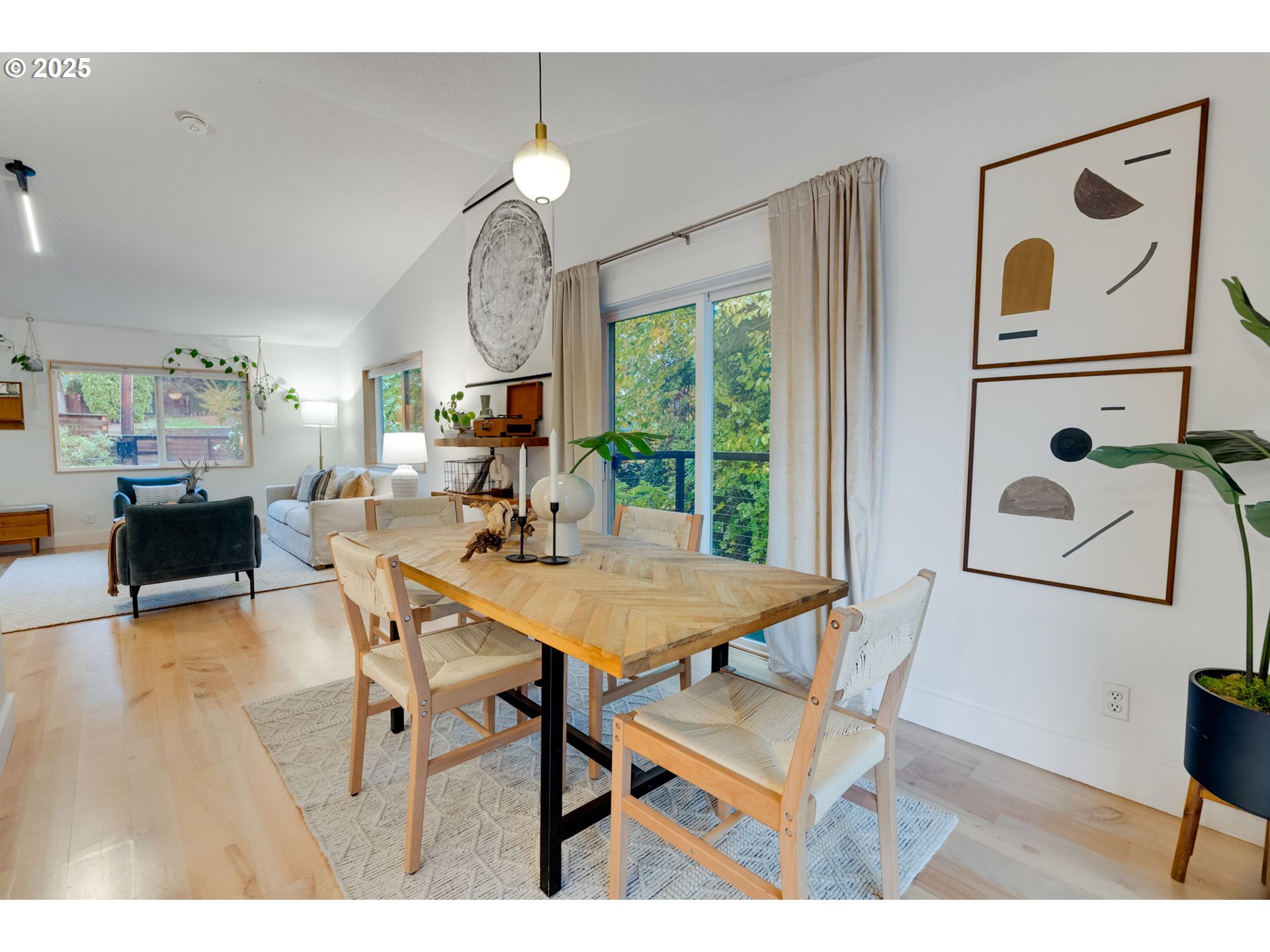 2733 Northeast 92nd Avenue Portland, OR 97220 - Photo 10 of 48 a view of a dining room with furniture and wooden floor