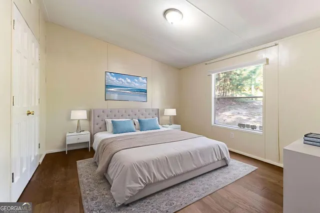 an empty room with wooden floor