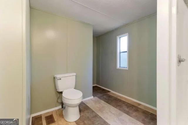 a view of a room with rack on the wall