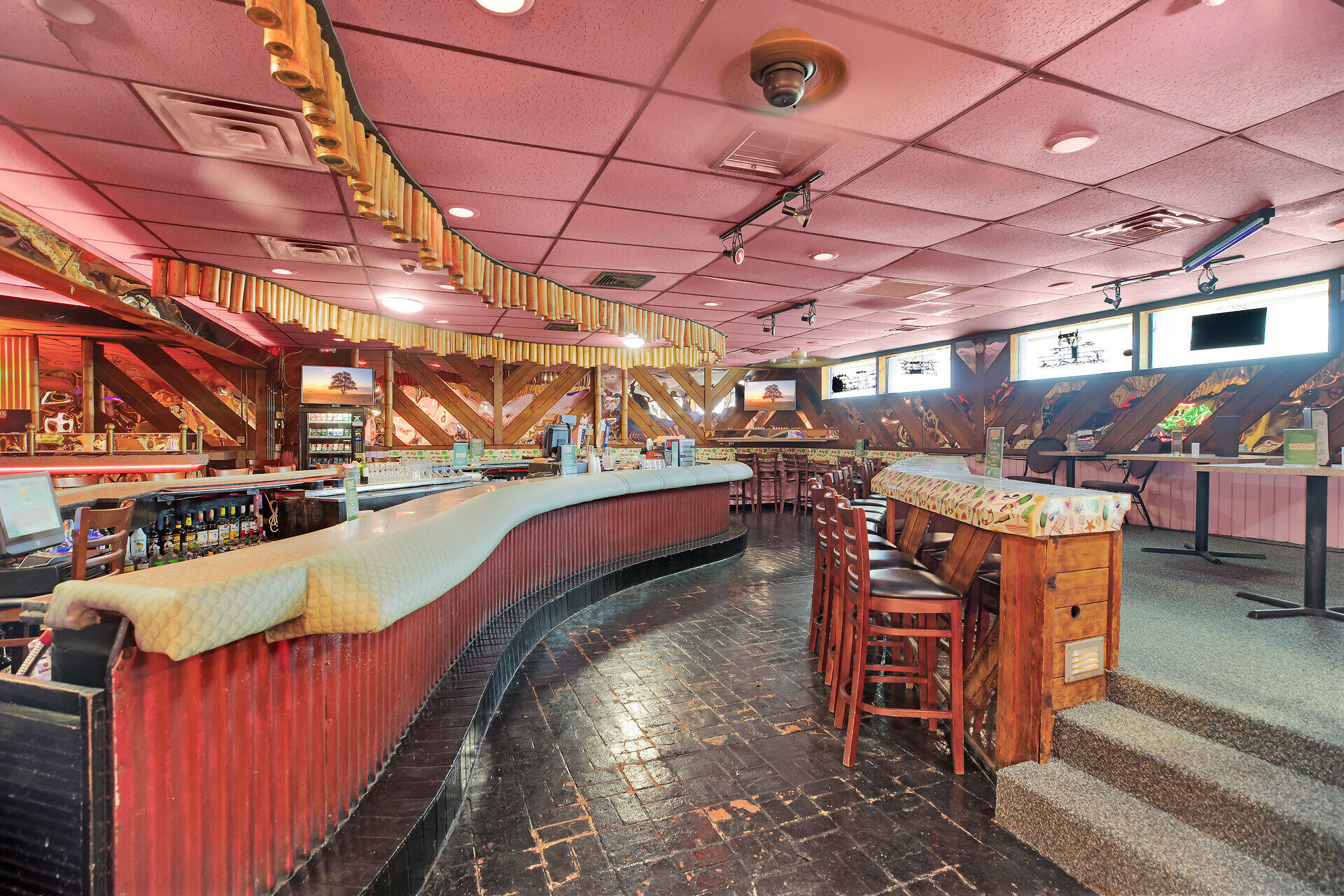 81908 Overseas Highway Islamorada, FL 33036 - Photo 22 of 23 a view of a storage room with a table and chairs