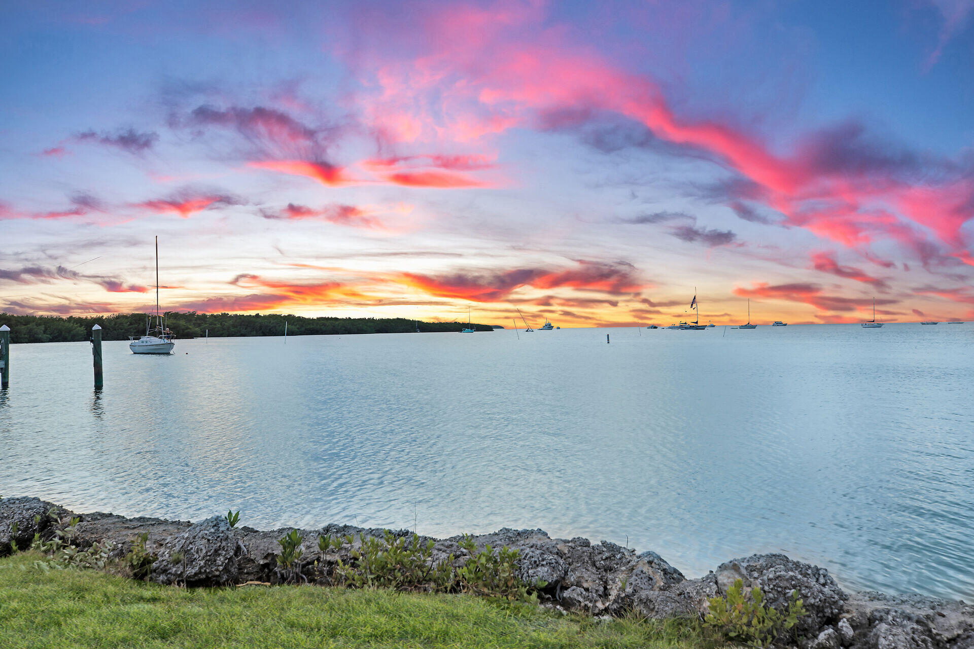 81908 Overseas Highway Islamorada, FL 33036 - Photo 5 of 23 a view of a lake and mountain in the back