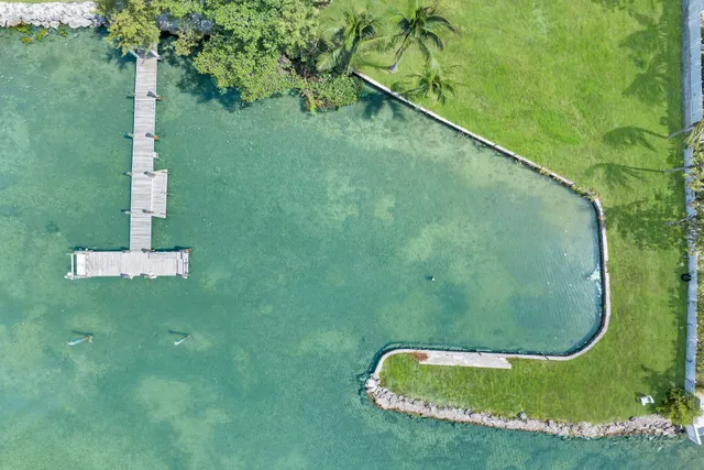 a view of a swimming pool with a balcony