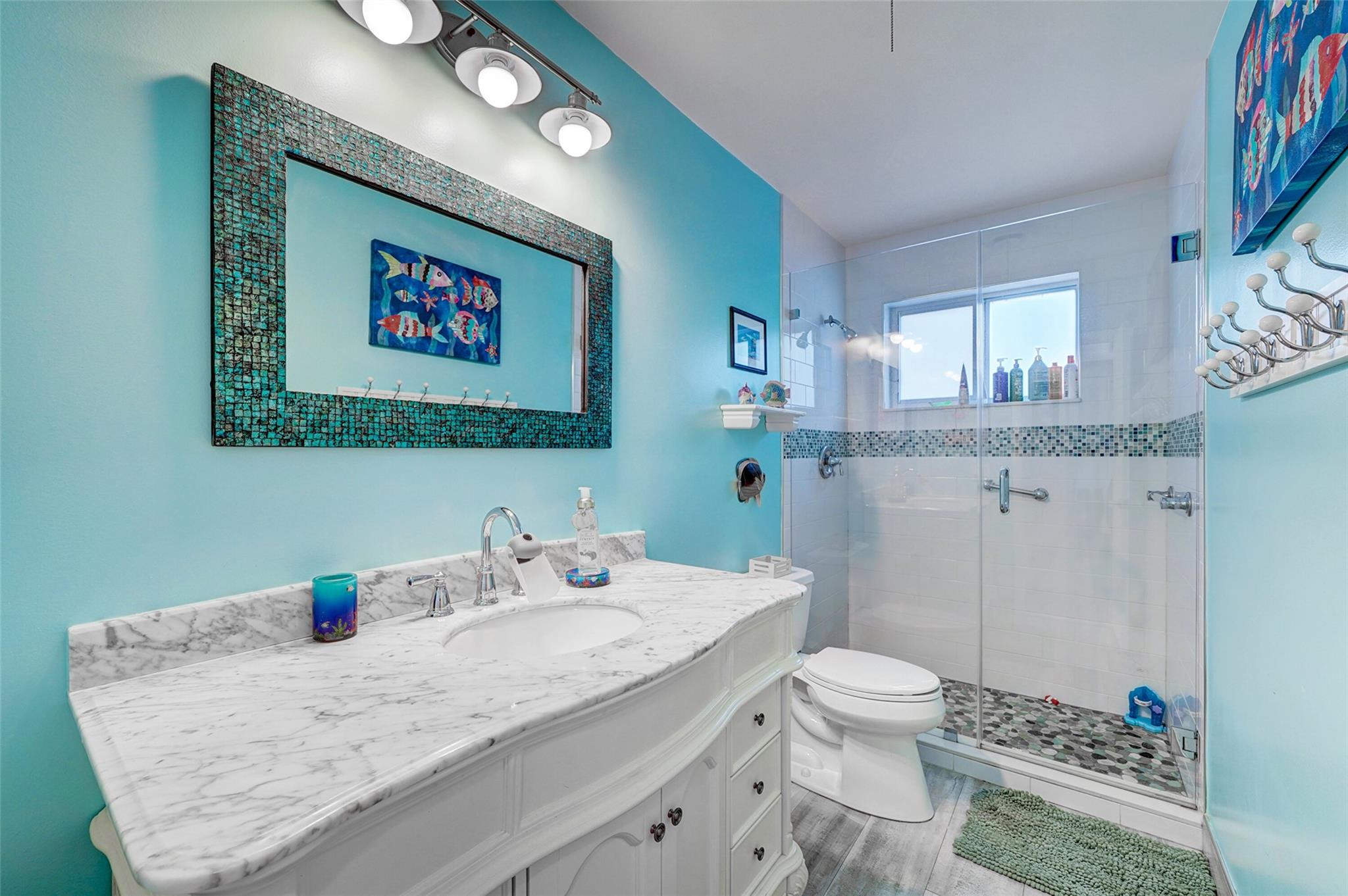 3314 West Park Road Hollywood, FL 33021 - Photo 15 of 25 a bathroom with a granite countertop sink a toilet and a mirror