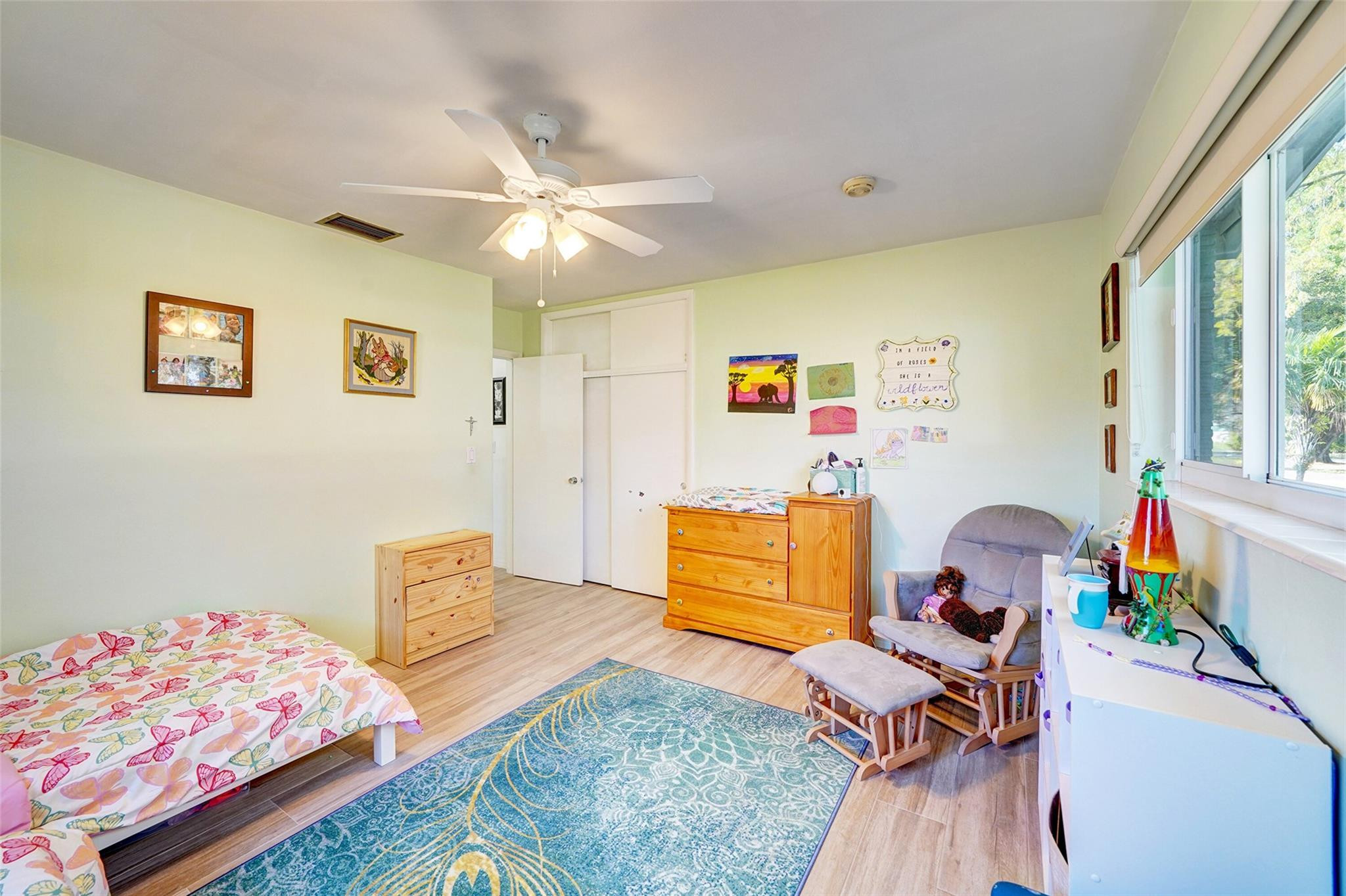 3314 West Park Road Hollywood, FL 33021 - Photo 17 of 25 a bedroom with furniture and a window