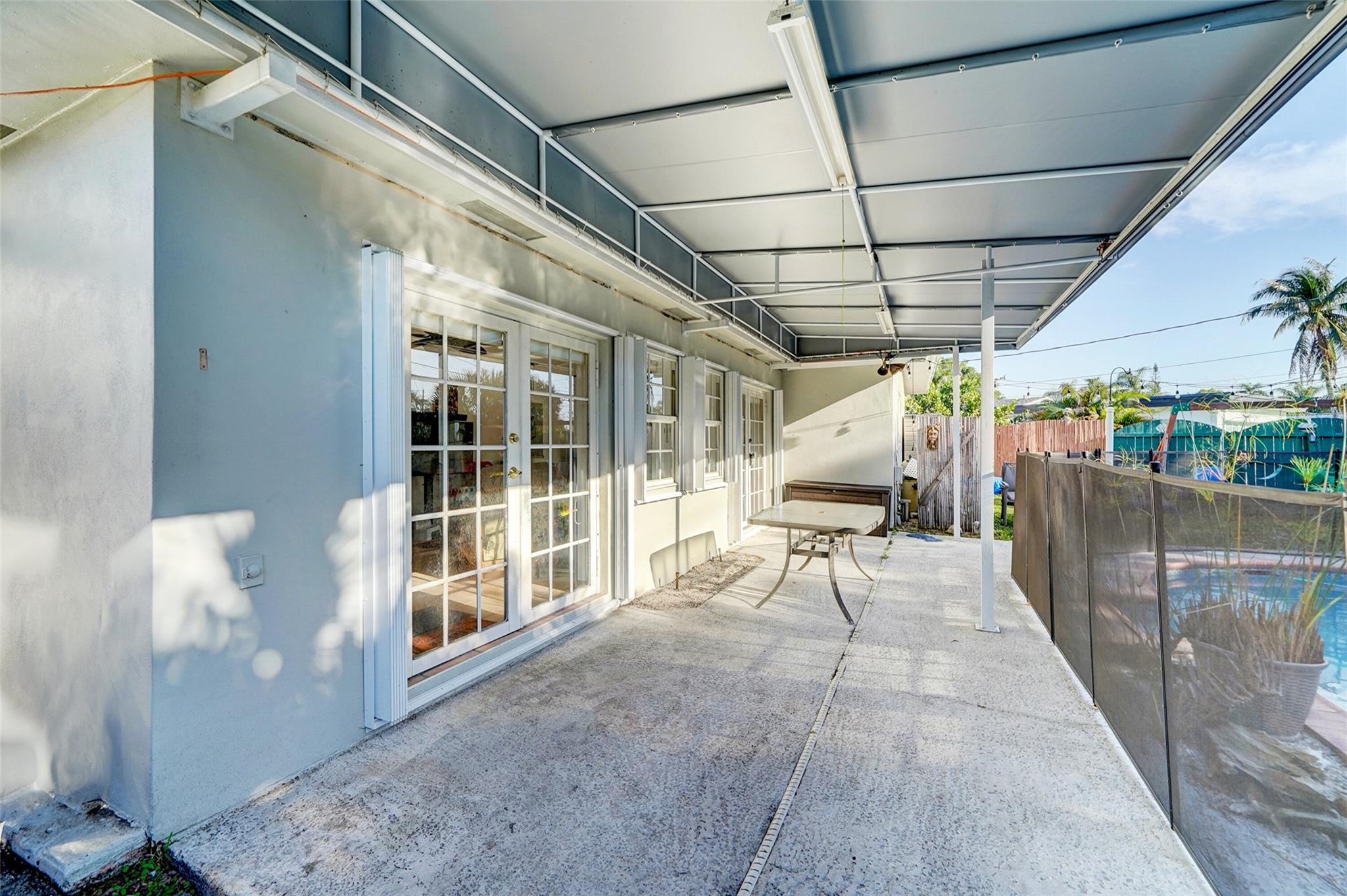 3314 West Park Road Hollywood, FL 33021 - Photo 23 of 25 a view of a porch with furniture