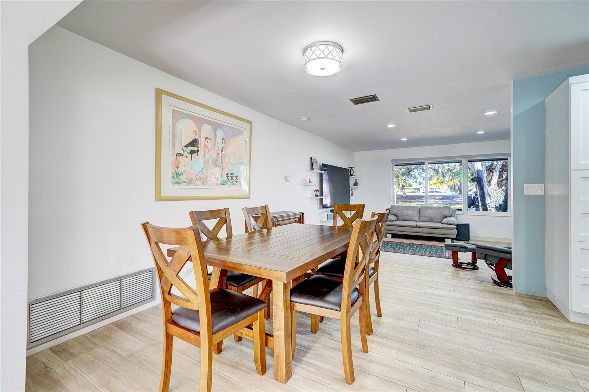 3314 West Park Road Hollywood, FL 33021 - Photo 8 of 25 a view of a dining room with furniture and wooden floor