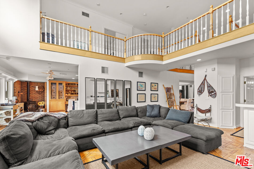 28765 Pine Canyon Road Lake Hughes, CA 93532 - Photo 15 of 58 a living room with furniture and a ceiling fan