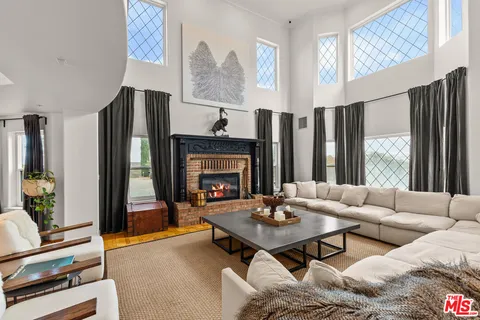 a view of a town with mountains in the background