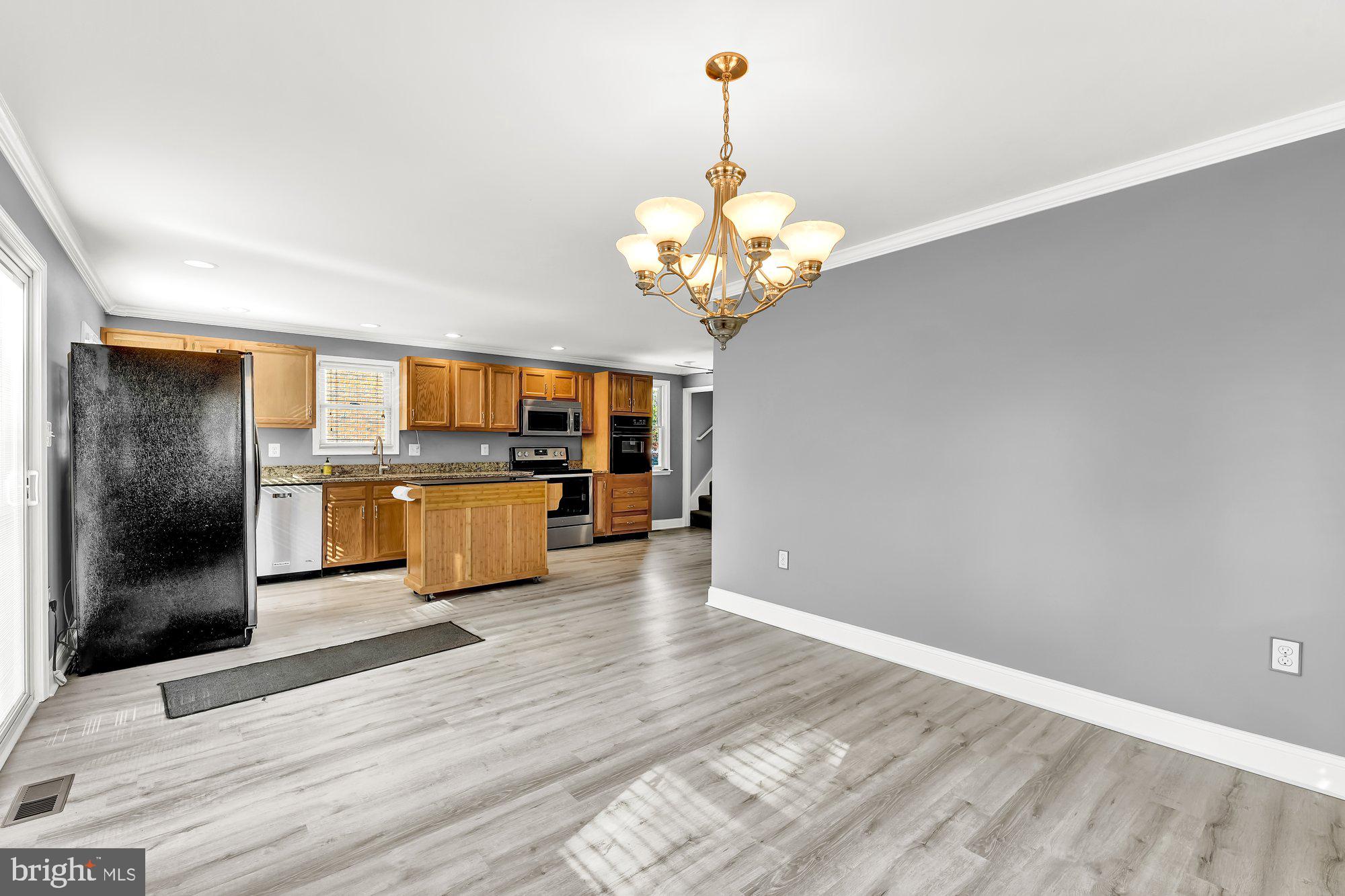 7339 Gunpowder Road Baltimore, MD 21220 - Photo 3 of 34 Huge Family Room leads to the kitchen & deck